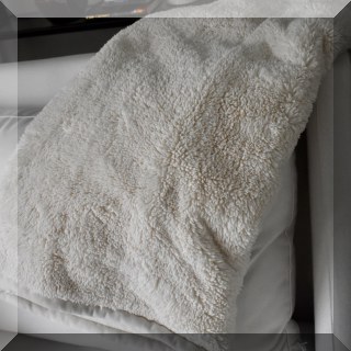 D60. Two faux fur blankets - $24 each